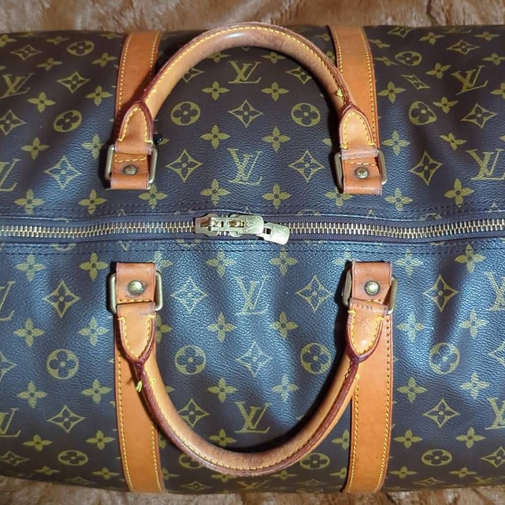 Louis Vuitton Keepall 60 Monogram Luxury Duffle Bag. VI0914 - Picture 7 of 13